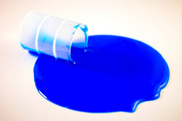 istock Blue slime spills out of barrel 642018604