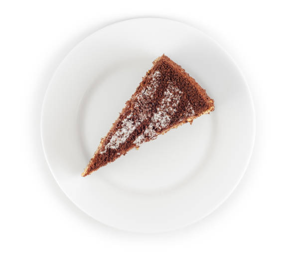 istock Piece of chocolate cake in plate isolated 642025744