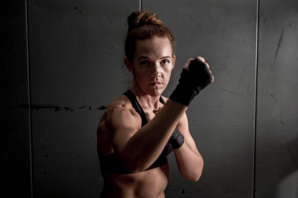 istock Woman with Fists Raised 642032810