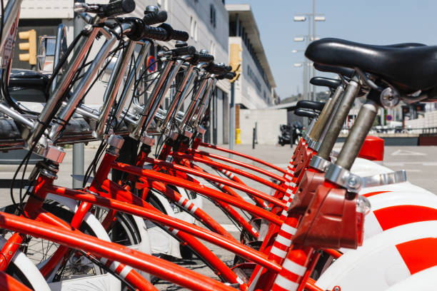 istock Row of red public bicycles 642037382