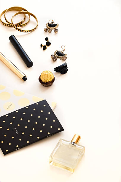 istock Gold, black and white. Woman's beauty makeup and accessories 642046390