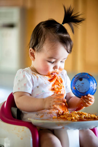 Cute Baby Girl Eating Spaghetti