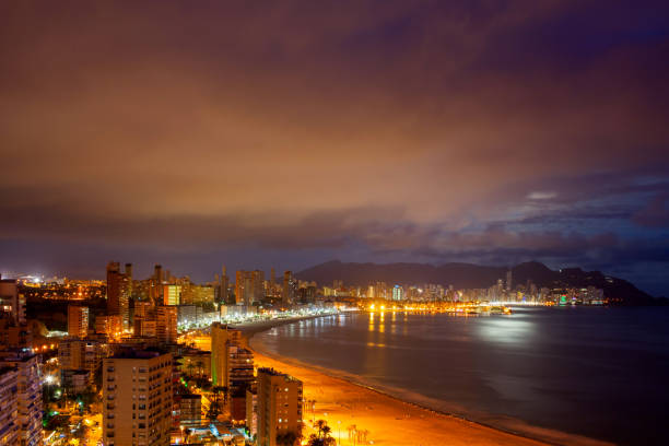 Benidorm beaches and skyscrapers at evening, known throughout Europe as Spanish major tourist destination with thousands of visitors a year.