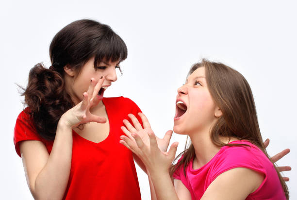 istock Two young woman in conflict 642054584