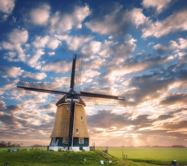 istock Windmill at sunrise in Netherlands. Beautiful old dutch windmill 642056140