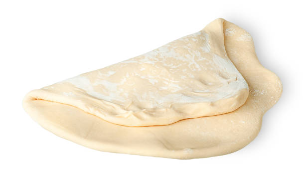 istock Roll the piece of dough folded in half 642056516