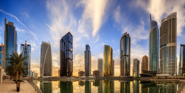 istock Panoramic view of Business bay and Lake Tower, reflection in a river, UAE 642058976