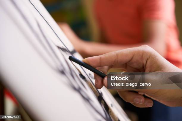 Male Hand Drawing Young Man Sketching Artist Training At School Stock Photo - Download Image Now