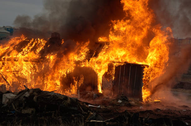 istock Fire. Burning old wooden house 642063170