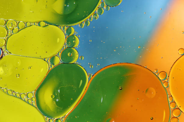 istock Green on orange oil in water abstract 642063550