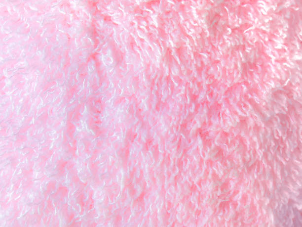 istock Texture of pink color fur fabric 642065388