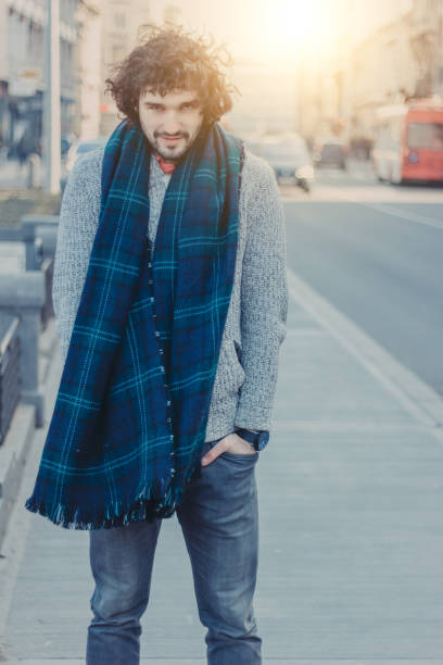 istock young man on the street 642066274