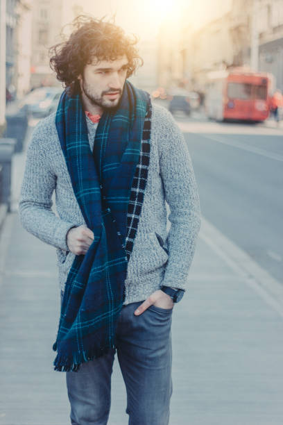 istock young man on the street 642066456