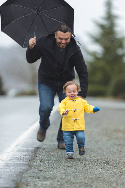 istock Family Walk in the Rain 642067462