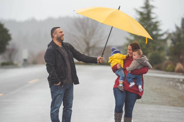 istock Family Walk in the Rain 642067466
