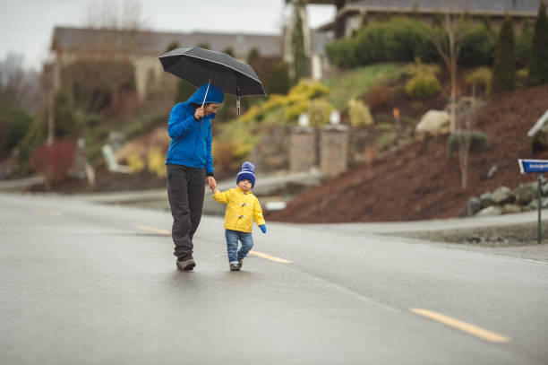 istock Family Walk in the Rain 642067474