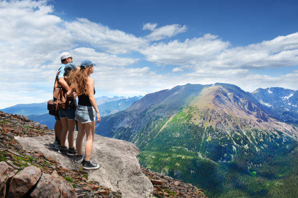 istock Family on summer hiking trip in mountains. 642067890