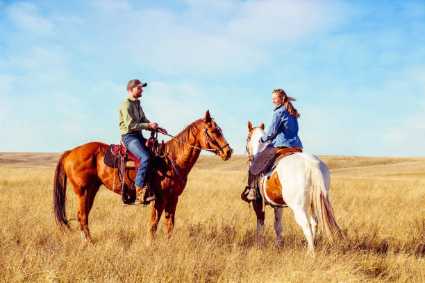 istock Young Couple On Horseback 642072220