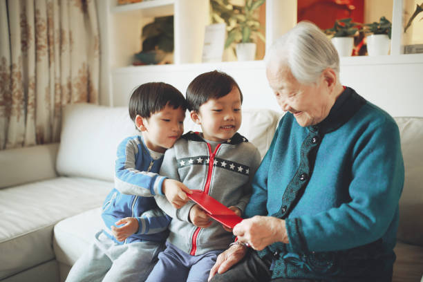 Happy Asian family, in the new year Happy Asian family, in the new year china chinese ethnicity smiling grandparent stock pictures, royalty-free photos & images