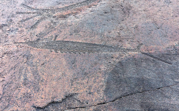istock Ancient petroglyphs on granite Onega Lake shore 642080660