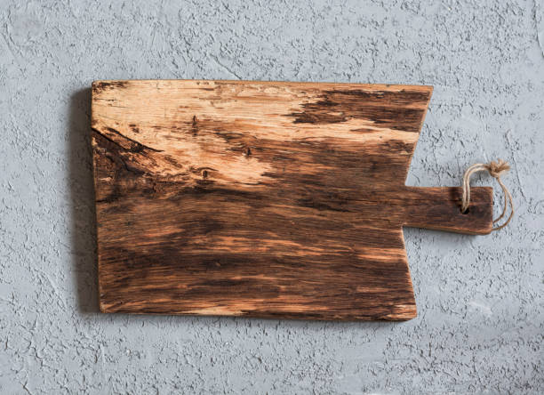 istock Empty vintage wooden cutting board. Top view, free space 642083338