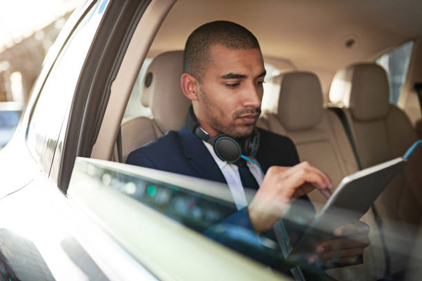 istock Using his tablet to get to his appointment on time 642089124