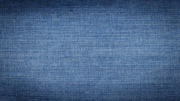 istock Texture of denim blue jean with macro concept. Denim 642094478