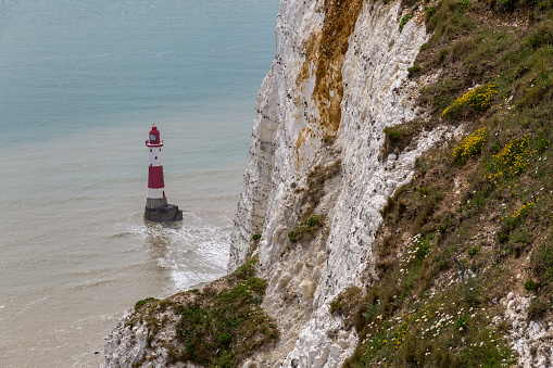 Beachy Head cliff and lighthouse, near Eastbourne, East Sussex, England, UK