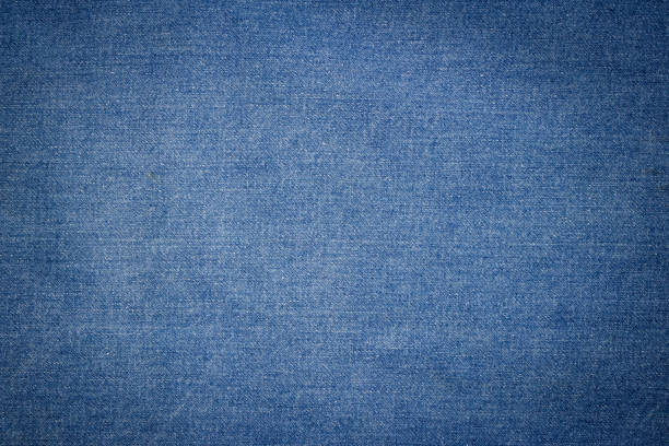 istock Texture of denim blue jean with macro concept. Denim 642100984