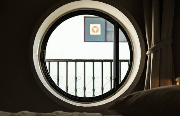 istock Round circle window with bright light in the morning 642103462