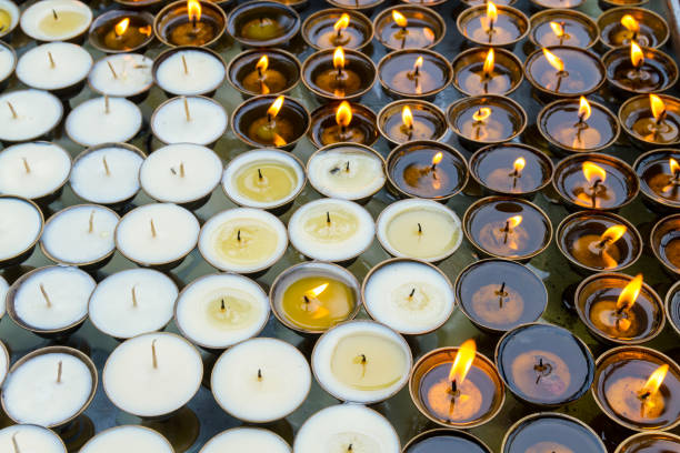 Butter Lamps burning at the religious place Swayambhunath in Nepal.