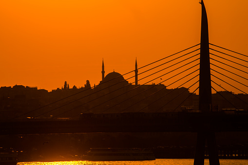 sunset and silhouette of a mosque in Istanbul