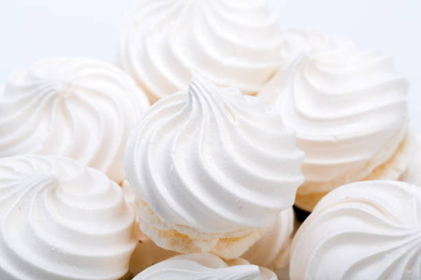 istock French vanilla meringue cookies on white background 642122088