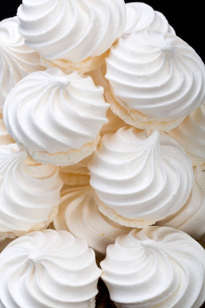 istock French vanilla meringue cookies on white background 642122200