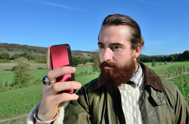 istock Young adult and one mobile phone, fall clothes 642127496