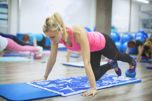 istock Beautiful pilates and fitness instructor 642131932