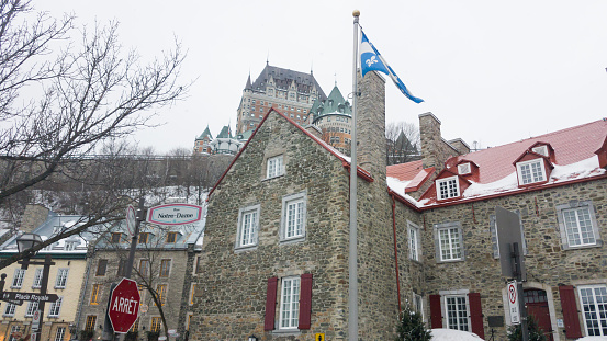 Canadian flag on a flagpole in Gananoque on Lake Ontario.