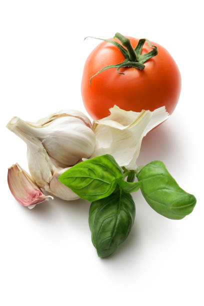 istock Ingredients: Basil, Garlic and Tomato Isolated on White Background 642169098