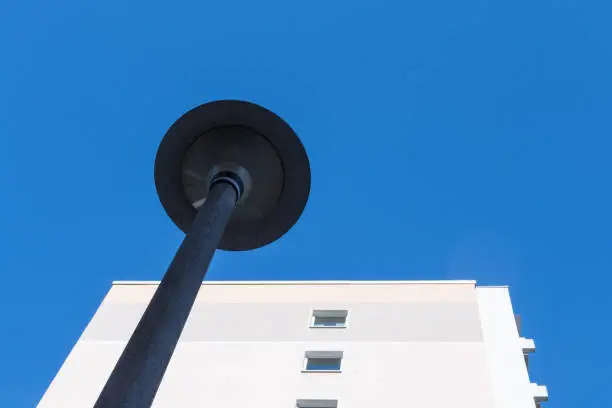 residential building with lantern and blue sky