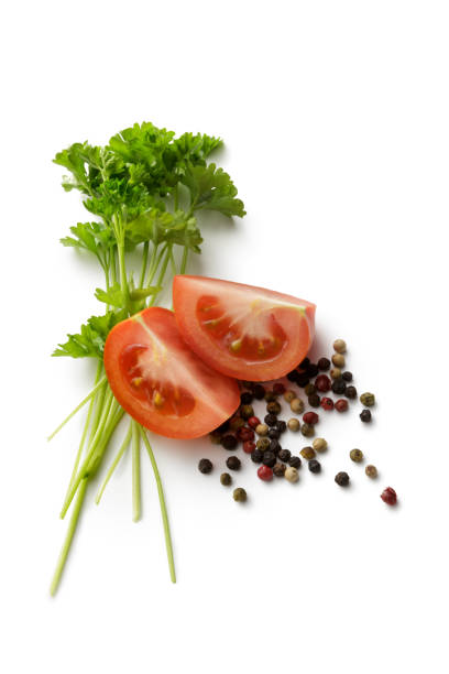 istock Ingredients: Tomato, Peppercorns and Parsley Isolated on White Background 642170028