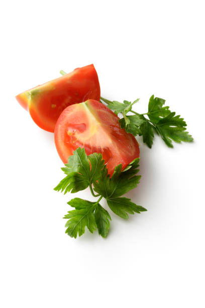 istock Ingredients: Tomato and Parsley Isolated on White Background 642172436