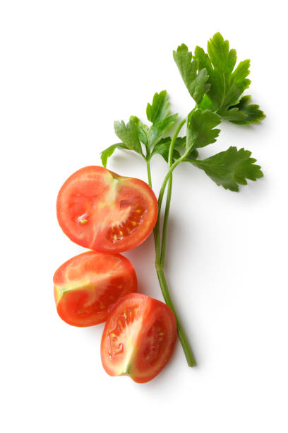 istock Ingredients: Tomato and Parsley Isolated on White Background 642172592