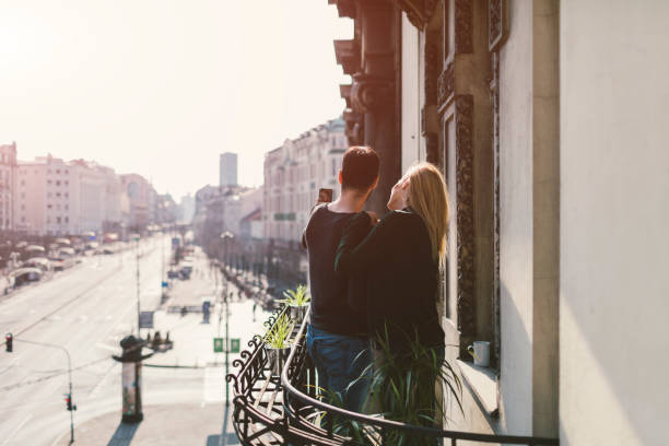 istock Couple on hotel balcony 642172956
