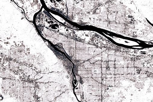 Black And White Satellite Image of Portland, Oregon, USA. Digital Composite. Contains modified Copernicus Sentinel data (2016) courtesy of ESA. URL of source image: https://scihub.copernicus.eu/dhus/#/home. The source data is in the public domain.