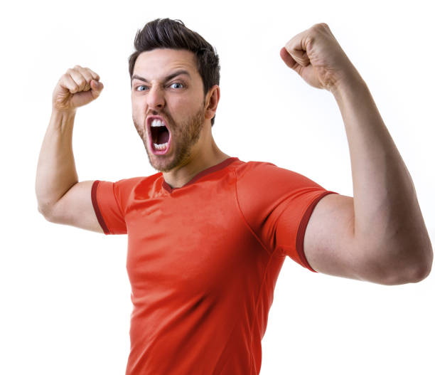 istock Fan / Sport Player on red uniform celebrating on white background 642176572