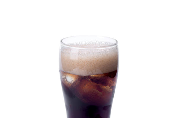 istock Cola and ice in clear glass with white background bubbles. 642182142