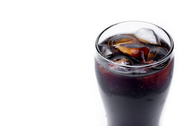 istock Cola in clear glass with ice. White background 642182222