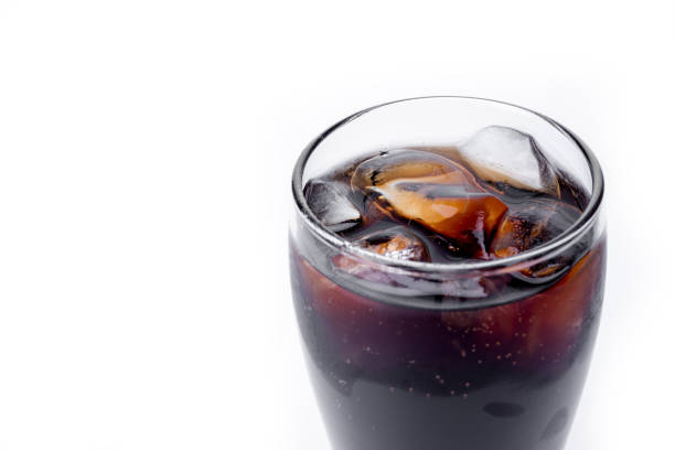 istock Cola in clear glass with ice. White background 642182246