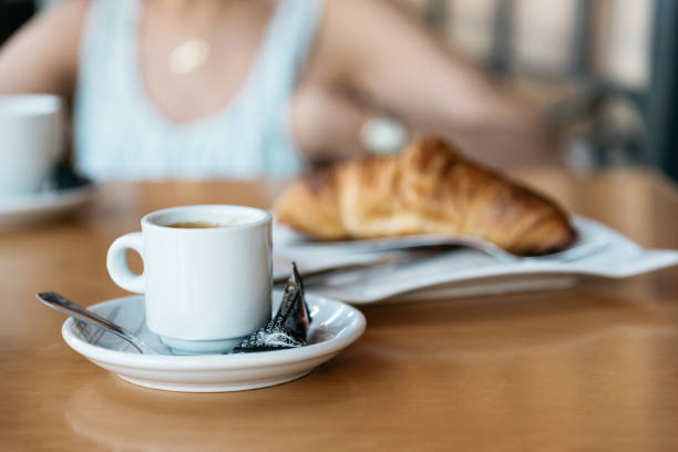 istock Coffee, croissant and woman on background 642182518