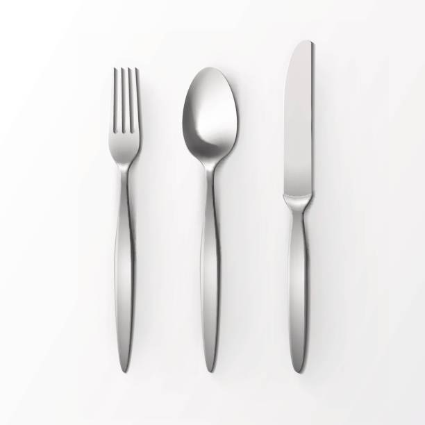 istock Cutlery Set of Silver Fork Spoon and Knife Top View Isolated on White Background. Table Setting 642182652